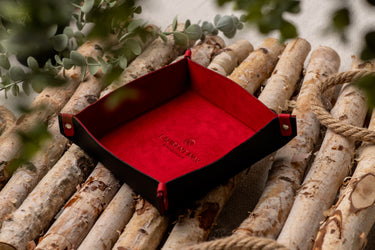 Handcrafted black leather valet tray with red microfiber interior by Laurent Nay Maroquinerie
