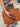 Leather glasses holder attached to a Laurent Nay leather travel bag