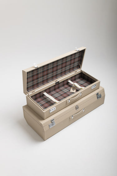 Open cream leather rear-seat case with tartan lining, displayed with its matching fitted luggage for a Mercedes-Benz 190 SL.