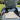 Handcrafted leather suitcase perfectly fitted inside the original trunk of a Jaguar XK140, custom-made by Laurent Nay Maroquinerie to maximize storage while preserving the car's authentic design.