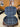 Open brown leather Soft Bag featuring a blue tartan lining, handcrafted in France by Laurent Nay Maroquinerie.