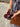 Open leather sunglasses case showing its protective design